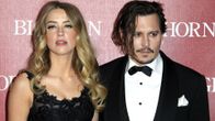 Amber Heard ja Johnny Depp.