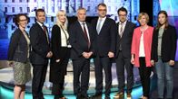 Puoluejohtajat potretissa.