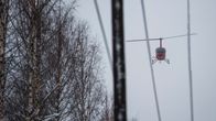 Helikopteri auttaa sähkökatkojen korjaamisessa Pohjois-Savossa.