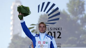 Ari Mannio mitali kaulassa.