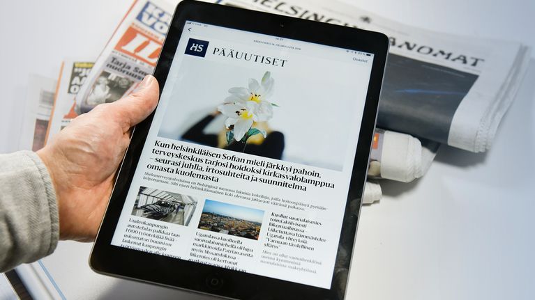 Ipad ja sanomalehtiä