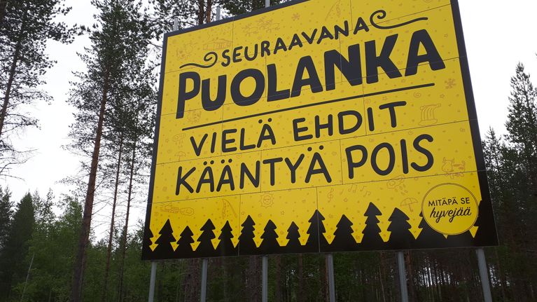 Puolanka tervetuloa kuntaan -kyltti.