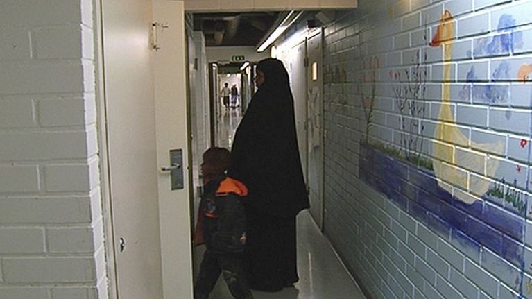 Turvapaikanhakijoita vastaanottokeskuksessa