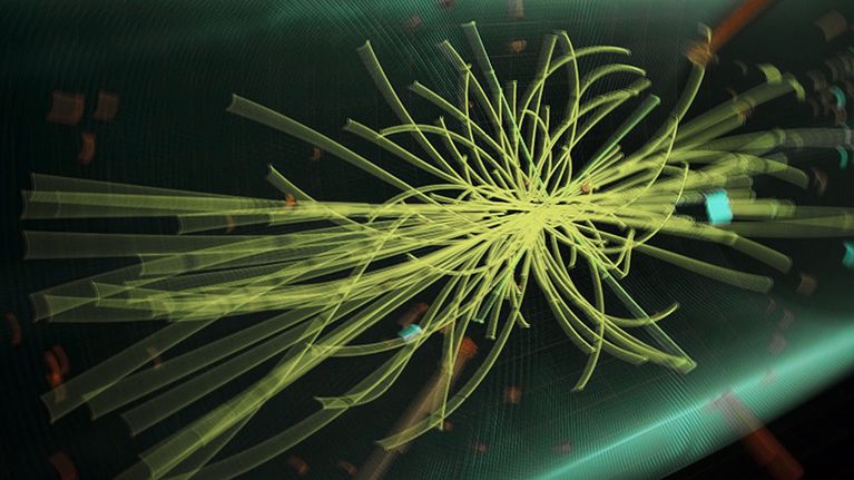Hiukkasten törmäys visualisoituna monitorin ruudulla CERN:ssä