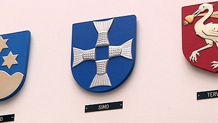 Simon vaakuna seinällä