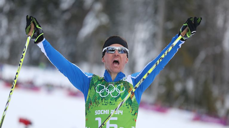 Sami Jauhojärvi tuulettaa olympiavoittajana.