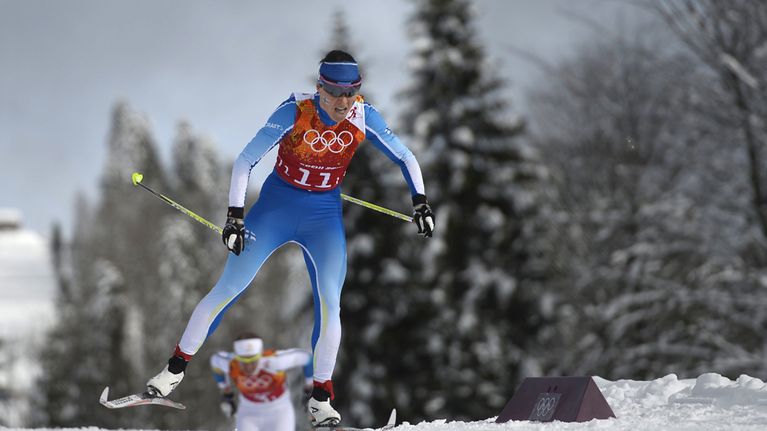 Suomen Aino-Kaisa Saarinen hiihtää olympialaisissa.