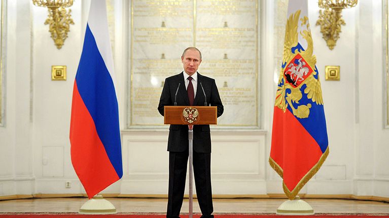 Vladimir Putin pitää puhettaan Kremlissä 28. maaliskuuta 2014.