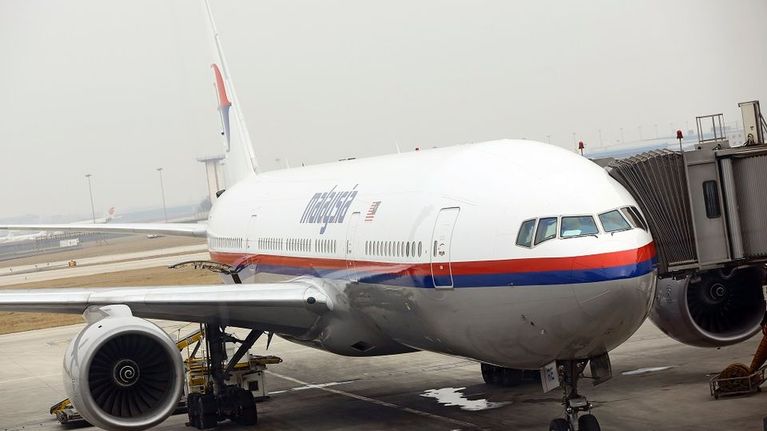 Malaysian Airlinesin Boeing 777 -kone Pekingin lentokentällä.