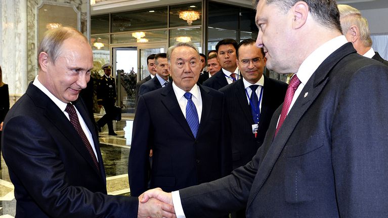 Venäjän presidentti Vladimir Putin ja Ukrainan presidentti Petro Porošenko.
