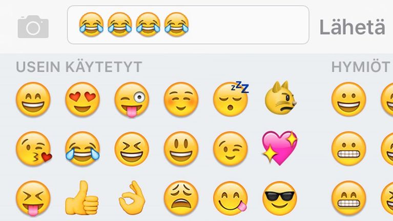 Emoji, iloinen itkevä naama.